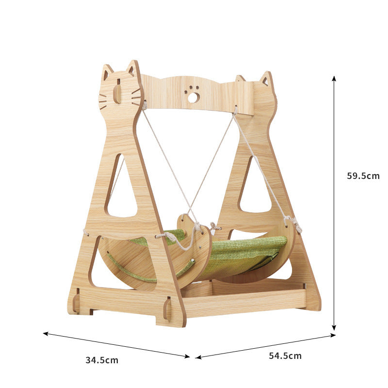 Rocking cat bed with suspended green resting surface